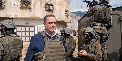 Atina'da işgal ordusu bakanı hakkında suç duyurusu