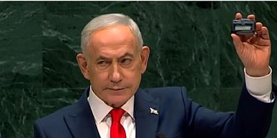 İşgalci Netanyahu, BM kürsüsünde elinde bombayla dünyayı tehdit etti