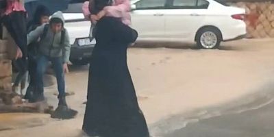 Mardin'de yağmurda yürek ısıtan görüntü